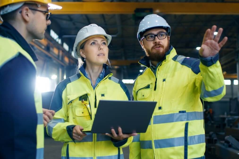 Engineers in PPE Talking